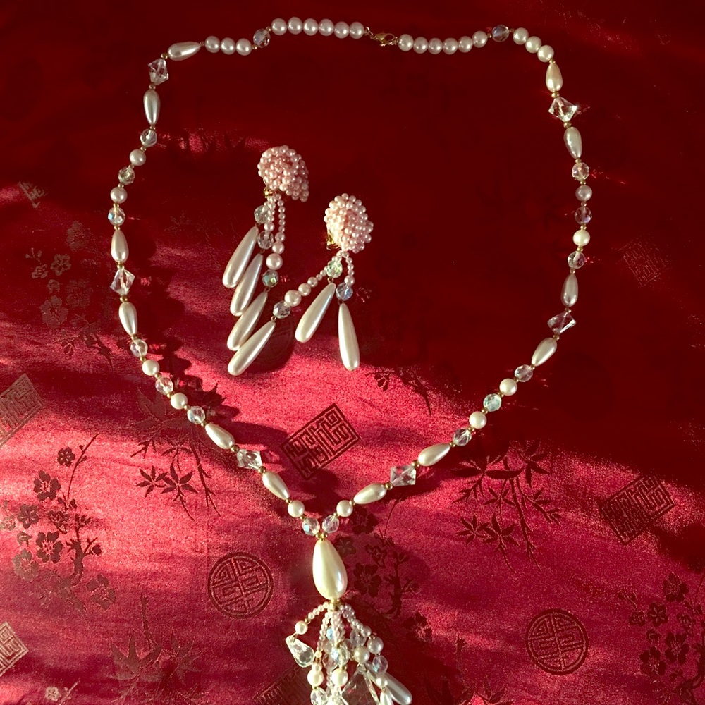 Necklace with matching clipped earrings.